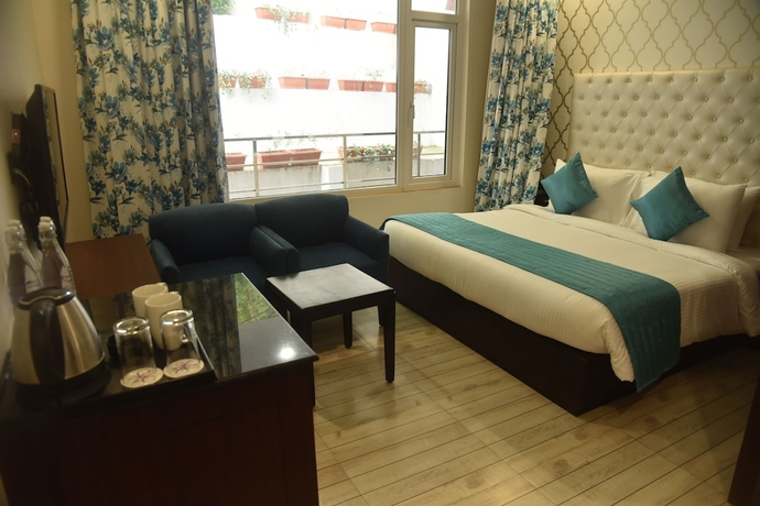 Imagen de la habitación del Hotel The Orchid Shimla. Foto 15