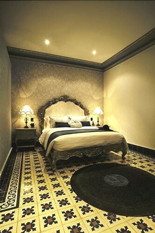 Imagen de la habitación del Hotel The Orchids. Foto 8