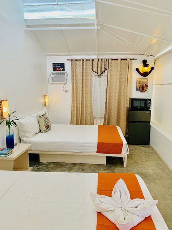 Imagen de la habitación del Hotel The Orient Beach Boracay. Foto 9