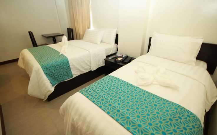 Imagen de la habitación del Hotel The Orient Beach Boracay. Foto 12