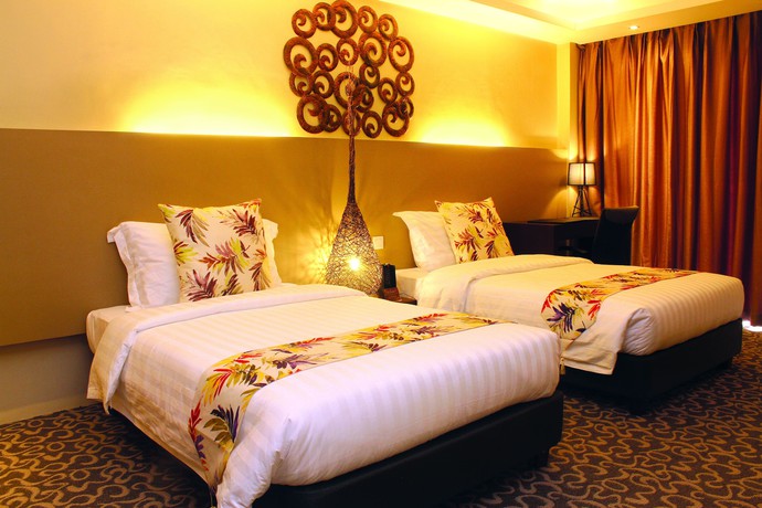 Imagen de la habitación del Hotel The Oriental Bataan. Foto 10