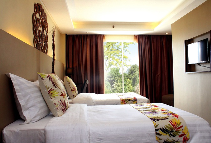 Imagen de la habitación del Hotel The Oriental Bataan. Foto 11