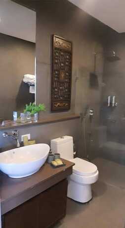 Imagen de la habitación del Hotel The Oriental Luxury Suites Tagaytay. Foto 12