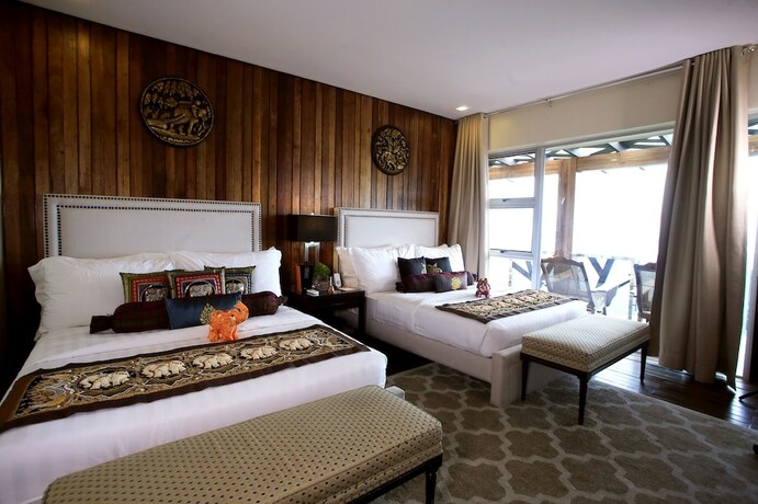 Imagen de la habitación del Hotel The Oriental Luxury Suites Tagaytay. Foto 15