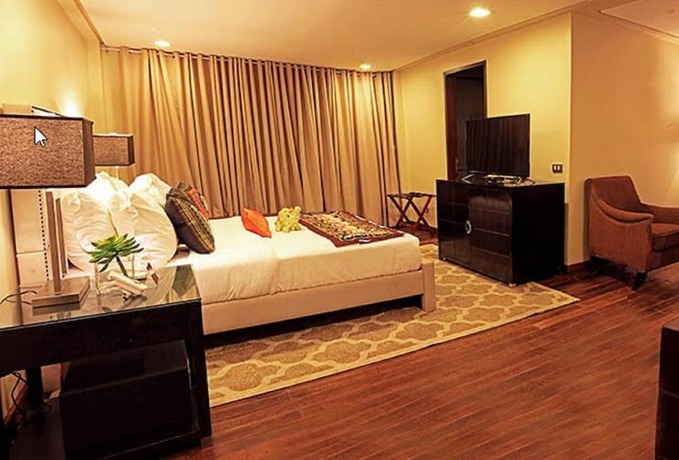 Imagen de la habitación del Hotel The Oriental Luxury Suites Tagaytay. Foto 16