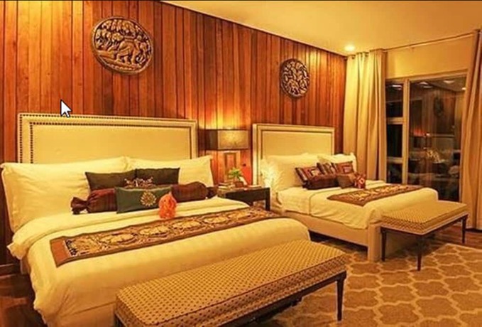 Imagen de la habitación del Hotel The Oriental Luxury Suites Tagaytay. Foto 17