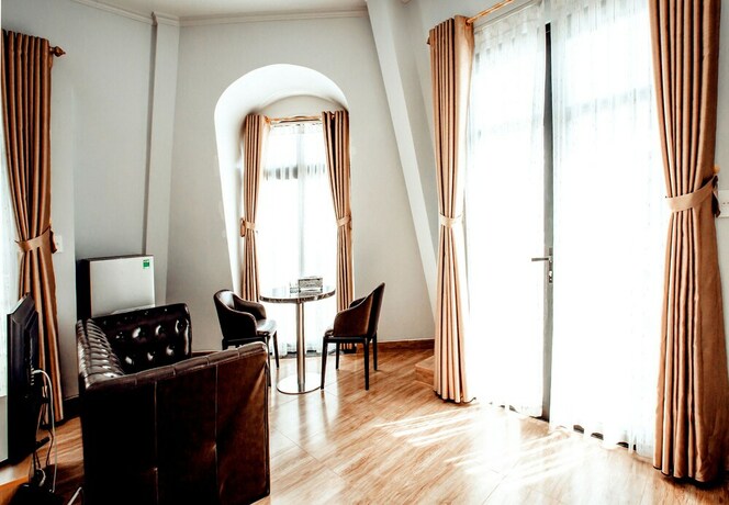 Imagen de la habitación del Hotel The Oriental Ruby. Foto 19