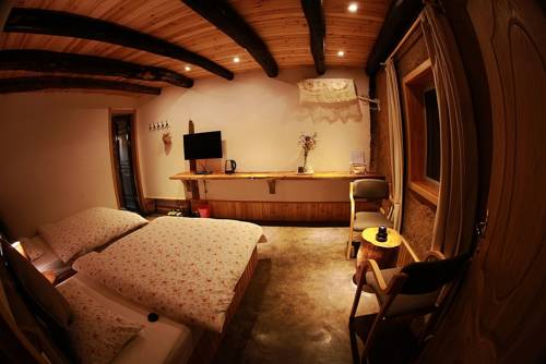 Imagen de la habitación del Hotel The Original Mountain Villa 33. Foto 6