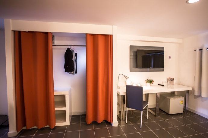 Imagen de la habitación del Hotel The Original Orange Rooms. Foto 9
