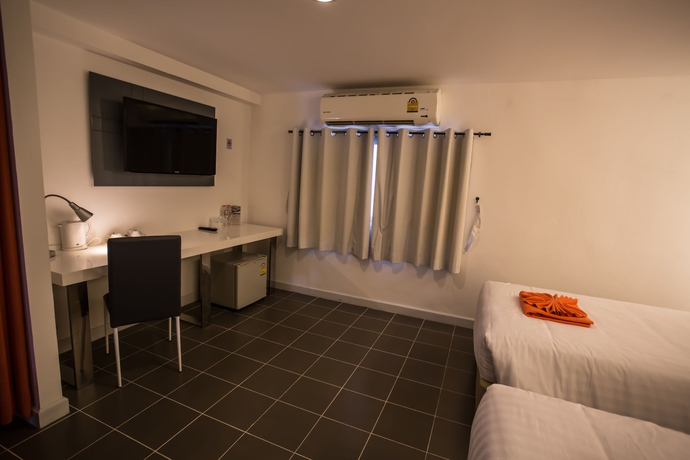 Imagen de la habitación del Hotel The Original Orange Rooms. Foto 10