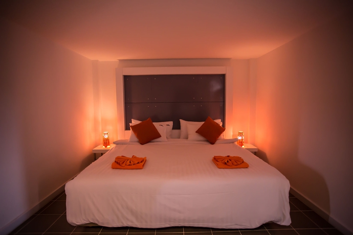 Imagen de la habitación del Hotel The Original Orange Rooms. Foto 12