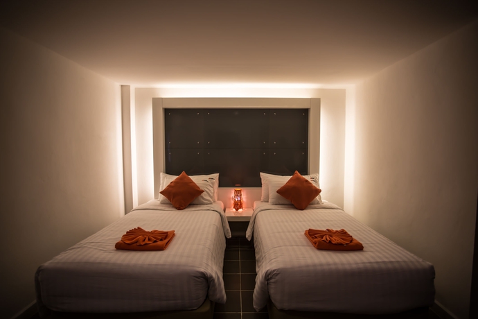 Imagen de la habitación del Hotel The Original Orange Rooms. Foto 14