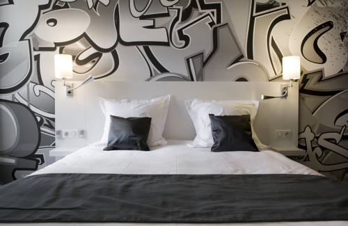 Imagen de la habitación del Hotel The Originals Boutique, De L'univers, Montluçon. Foto 6