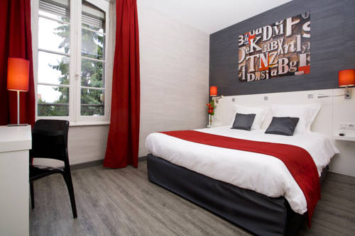 Imagen de la habitación del Hotel The Originals Boutique, De L'univers, Montluçon. Foto 9