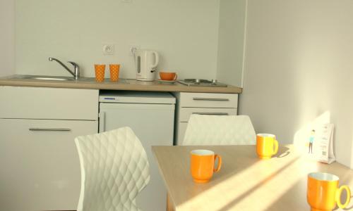 Imagen de la habitación del Hotel The Originals Boutique, De Perros. Foto 10