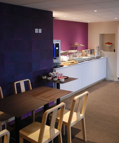 Imagen del bar/restaurante del Hotel The Originals Boutique, Du Château, Dinan. Foto 4