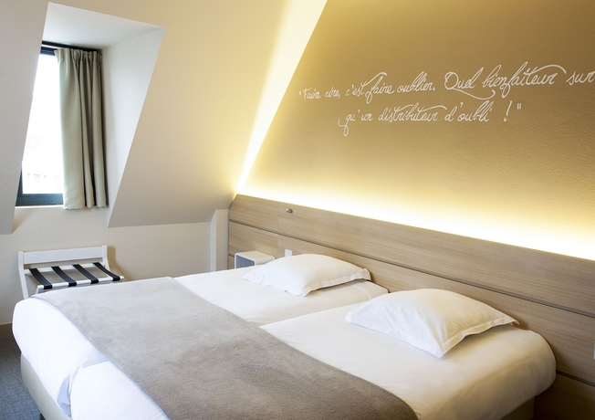 Imagen de la habitación del Hotel The Originals Boutique, Du Château, Dinan. Foto 12