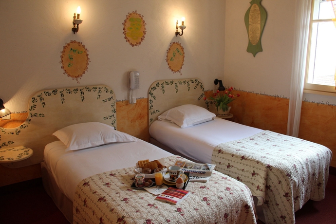 Imagen de la habitación del Hotel The Originals Boutique, Du Parc. Foto 10