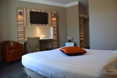 Imagen de la habitación del Hotel The Originals Boutique, Grand St Pierre. Foto 8