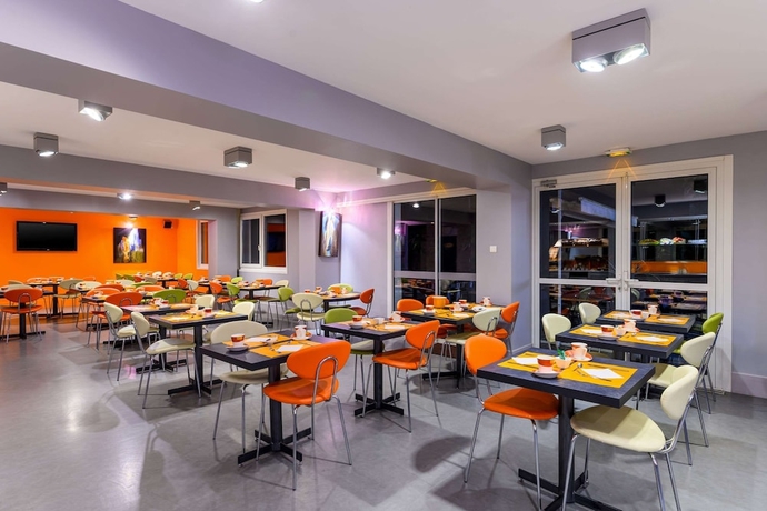 Imagen del bar/restaurante del Hotel The Originals Boutique, Hôtel Beauséjour, Poitiers Nord Futuroscope. Foto 5