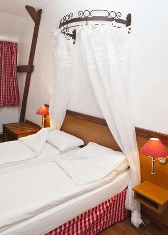 Imagen de la habitación del Hotel The Originals Boutique, Hôtel La Ferme du Pape, Eguisheim. Foto 4