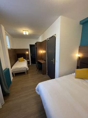 Imagen de la habitación del Hotel The Originals Boutique, Hôtel Le Marignan,Le Havre Centre Gare. Foto 11