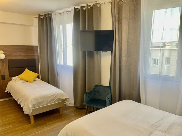 Imagen de la habitación del Hotel The Originals Boutique, Hôtel Le Marignan,Le Havre Centre Gare. Foto 14