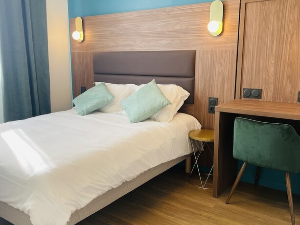 Imagen de la habitación del Hotel The Originals Boutique, Hôtel Le Marignan,Le Havre Centre Gare. Foto 15