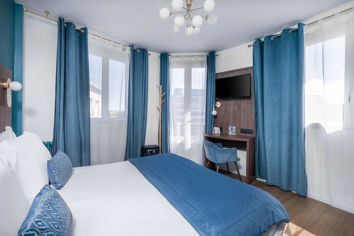 Imagen de la habitación del Hotel The Originals Boutique, Hôtel Le Marignan,Le Havre Centre Gare. Foto 18