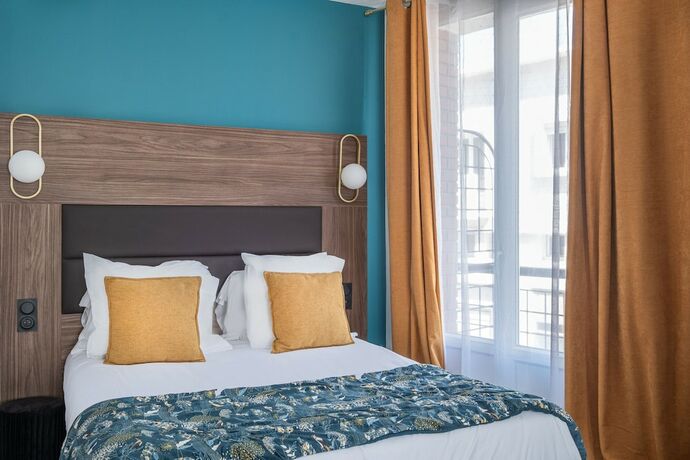 Imagen de la habitación del Hotel The Originals Boutique, Hôtel Le Marignan,Le Havre Centre Gare. Foto 19