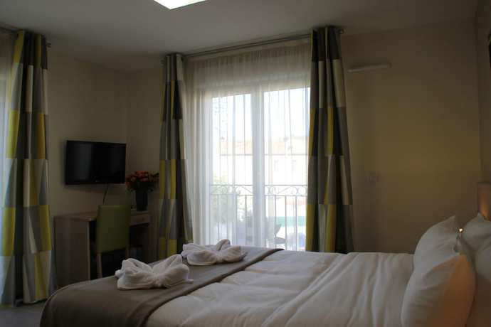 Imagen de la habitación del Hotel The Originals Boutique, Hôtel l\'Occitan, Aubagne Nord. Foto 9