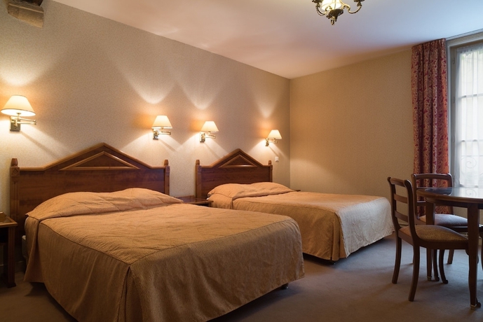 Imagen de la habitación del Hotel The Originals Boutique, Hostellerie Des Trois Pigeons. Foto 8