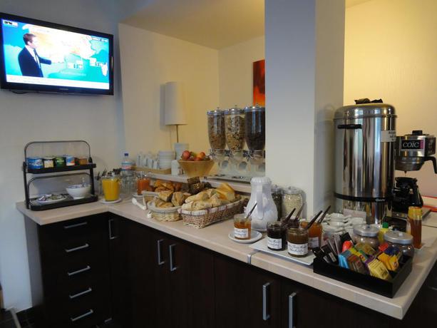 Imagen del bar/restaurante del Hotel The Originals Boutique, La Baie De Morlaix. Foto 3