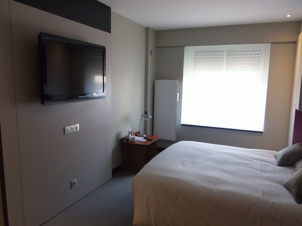 Imagen de la habitación del Hotel The Originals Boutique, La Chaussairie, Rennes. Foto 2