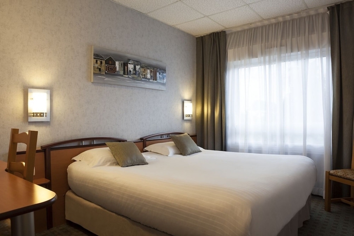 Imagen de la habitación del Hotel The Originals Boutique, La Chaussairie, Rennes. Foto 8