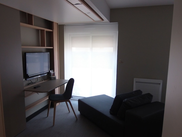 Imagen de la habitación del Hotel The Originals Boutique, La Chaussairie, Rennes. Foto 17