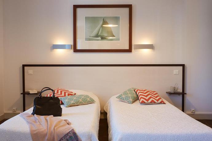 Imagen de la habitación del Hotel The Originals Boutique, La Colonne De Bronze. Foto 2