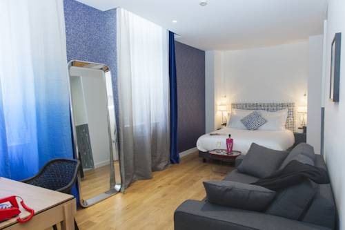 Imagen de la habitación del Hotel The Originals Boutique, Le Lion, Clermont-ferrand. Foto 5