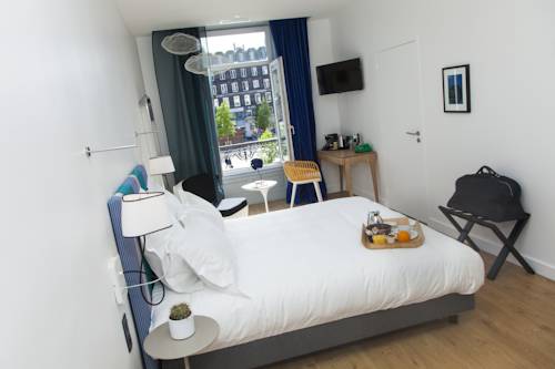 Imagen de la habitación del Hotel The Originals Boutique, Le Lion, Clermont-ferrand. Foto 6