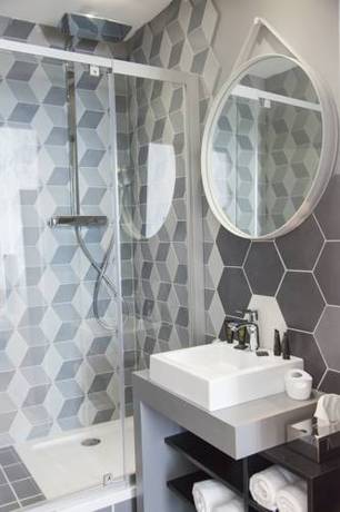 Imagen de la habitación del Hotel The Originals Boutique, Le Lion, Clermont-ferrand. Foto 10