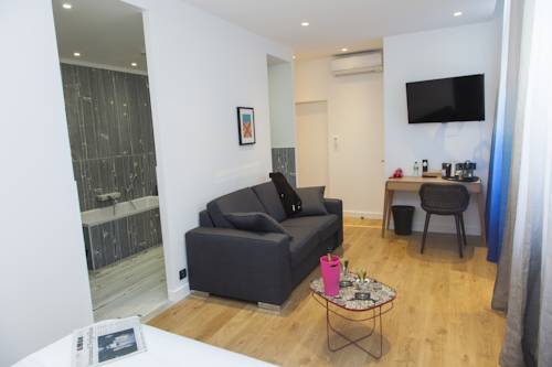 Imagen de la habitación del Hotel The Originals Boutique, Le Lion, Clermont-ferrand. Foto 16