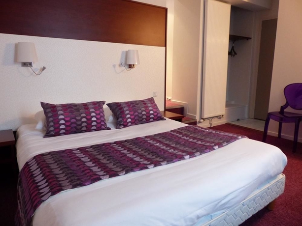 Imagen de la habitación del Hotel The Originals Boutique, Le Lion D'or. Foto 6