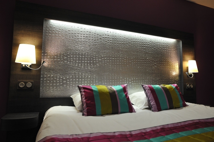 Imagen de la habitación del Hotel The Originals Boutique, Le Lion D'or. Foto 17