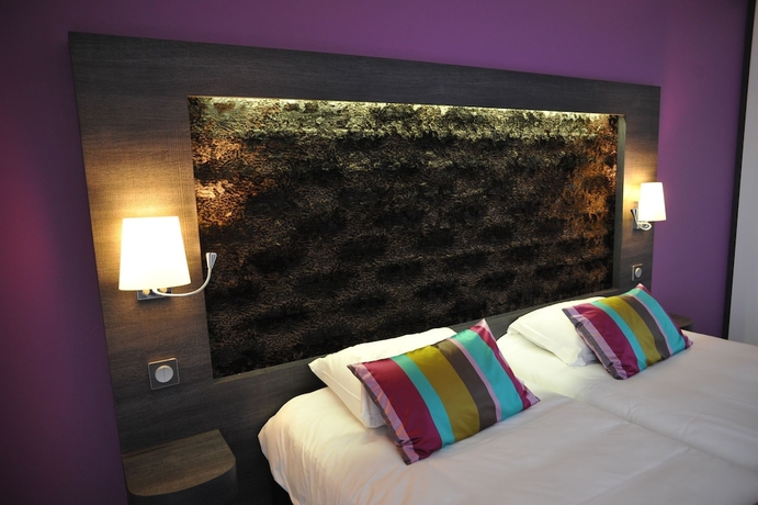 Imagen de la habitación del Hotel The Originals Boutique, Le Lion D'or. Foto 18