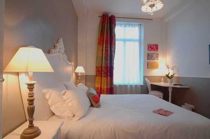 Imagen de la habitación del Hotel The Originals Boutique, Le Londres, Saumur. Foto 2