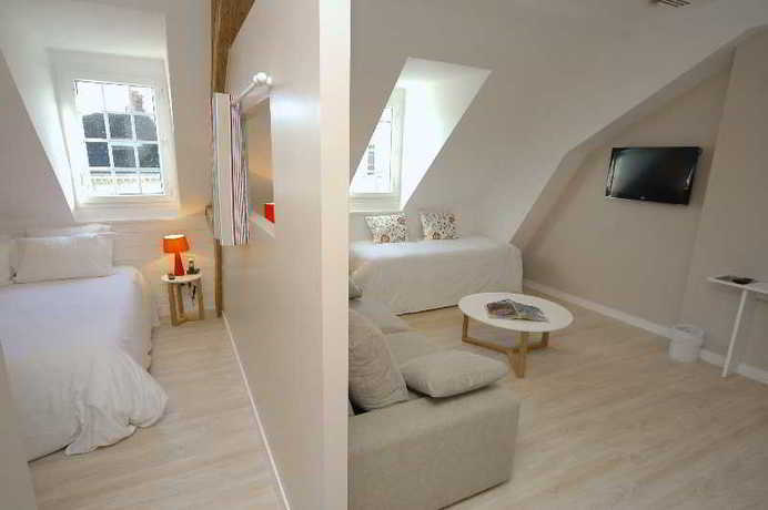 Imagen de la habitación del Hotel The Originals Boutique, Le Londres, Saumur. Foto 7