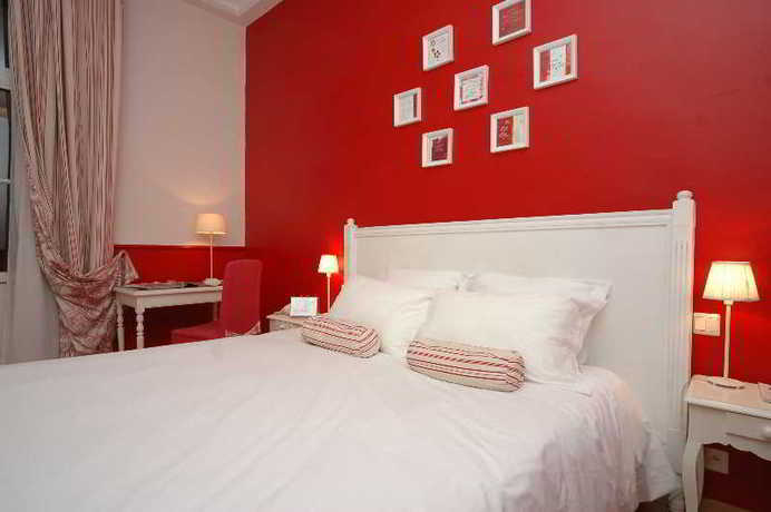 Imagen de la habitación del Hotel The Originals Boutique, Le Londres, Saumur. Foto 11