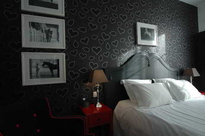 Imagen de la habitación del Hotel The Originals Boutique, Le Londres, Saumur. Foto 12