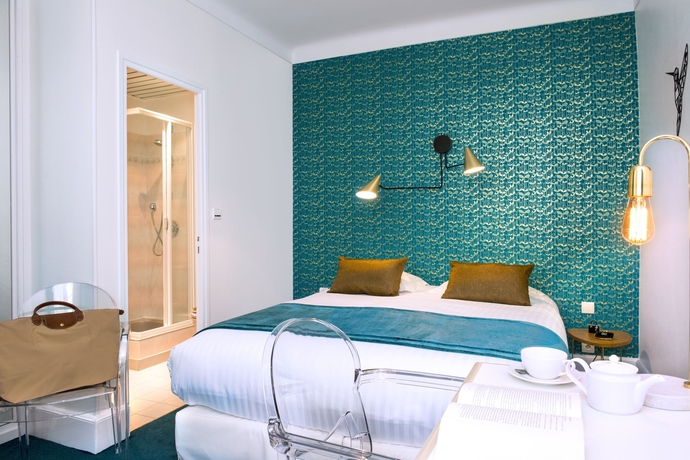 Imagen de la habitación del Hotel The Originals Boutique, Les Nations, Vichy. Foto 4