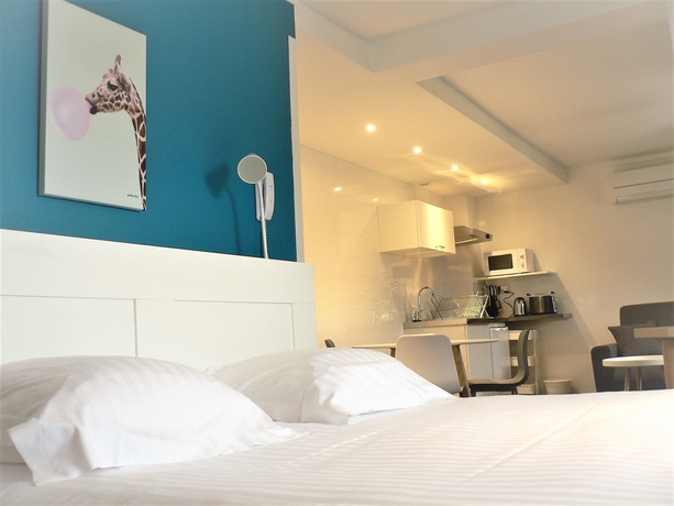 Imagen de la habitación del Hotel The Originals Boutique, Les Nations, Vichy. Foto 5